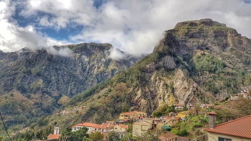 High angle view of townscape and mountains against sky curral das freiras