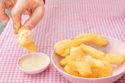 Close-up of hand holding food