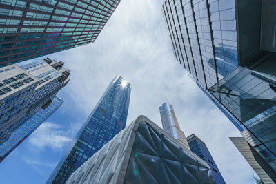 Low angle view of skyscrapers against sky