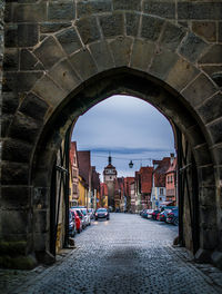 Buildings seen through archway