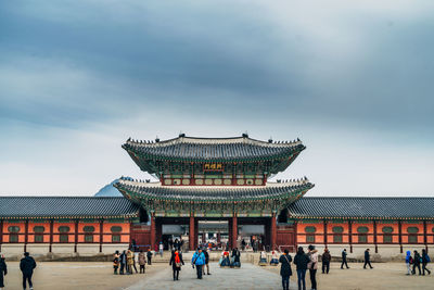 Tourist visiting historical building in city