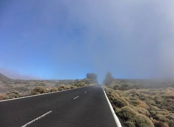 Road amidst landscape against clear sky