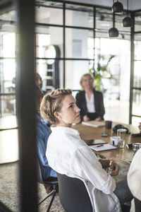 Business professionals in meeting at office