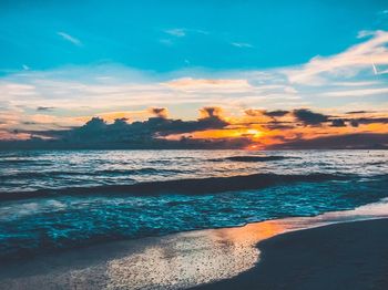 Scenic view of sea against sky during sunset