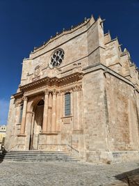 Low angle view of historical building against sky