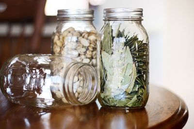 Close-up of food in jars on table