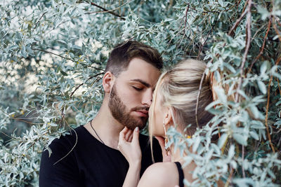 Portrait of young couple outdoors