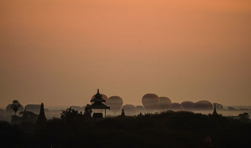 Panoramic view of historic building against sky during sunset