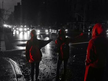 Woman standing at night