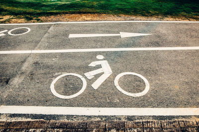 High angle view of sign on road