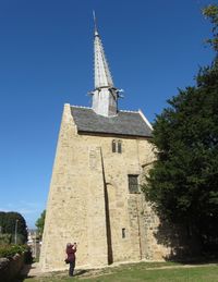 Low angle view of cross against clear sky