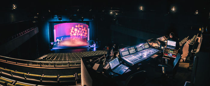 Panoramic shot of illuminated lighting equipment at night
