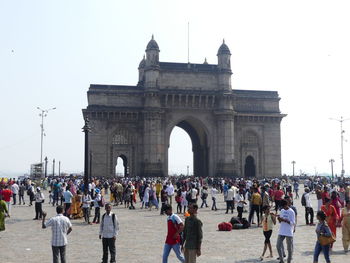 Group of people in front of historical building