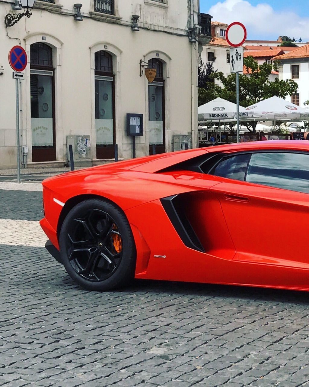 RED CAR PARKED