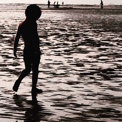 Reflection of people in water