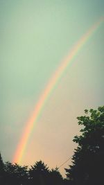 Low angle view of rainbow against sky