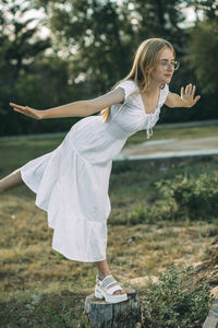 Elegance of a young woman maintaining balance, symbolizing both physical and mental wellness