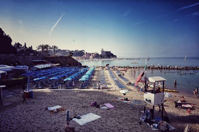 View of beach against blue sky