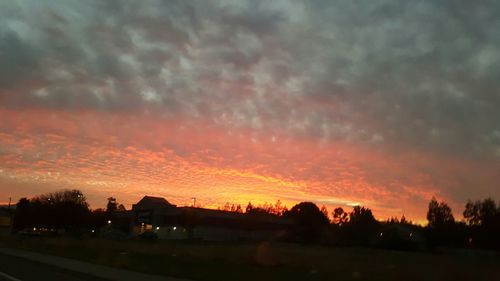 Scenic view of landscape at sunset