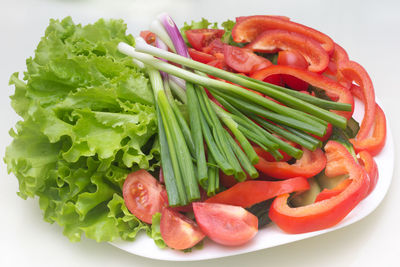 High angle view of chopped vegetables in plate