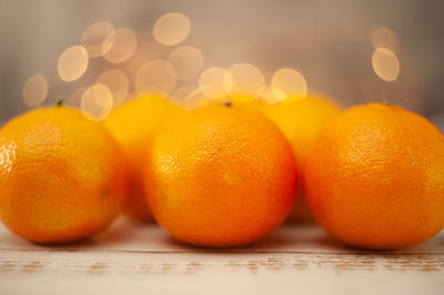 Close-up of orange fruits on table