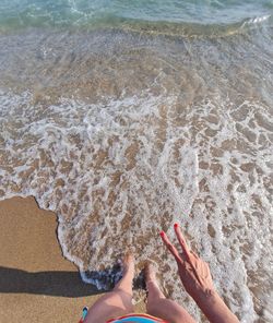 Low section of person on beach