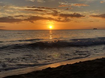 Scenic view of sea against sky during sunset