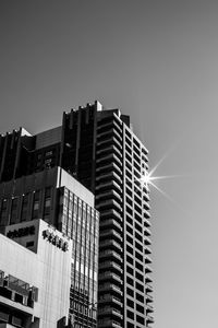 Low angle view of modern buildings against sky