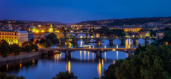 The view of prague bridges over the vltava river viewed from letna park in prague, czech republic.