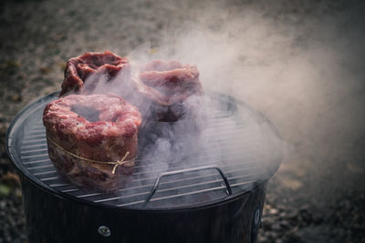 Close-up of meat on barbecue grill