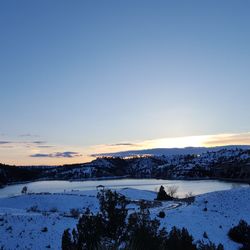 Scenic view of snow covered landscape