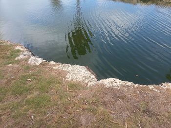 High angle view of rocks by the lake