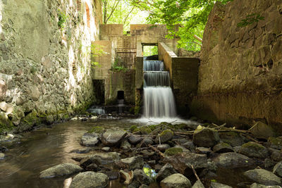 Stream flowing through rocks