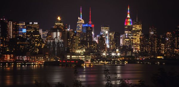 Illuminated city lit up at night