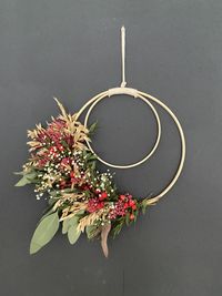 High angle view of flowering plant on table against wall