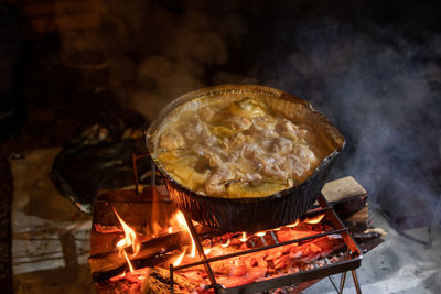 High angle view of meat on barbecue grill