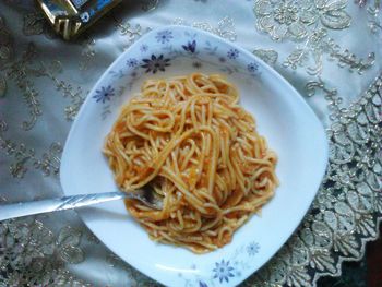 Close-up of noodles in plate on table