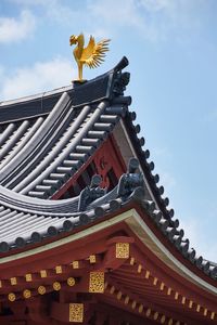 Low angle view of traditional building against sky