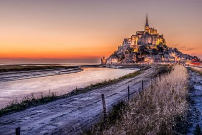 Scenic view of sea at sunset