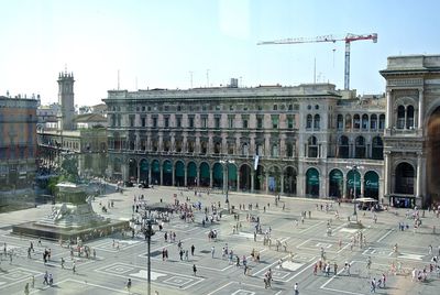 Tourists in front of building