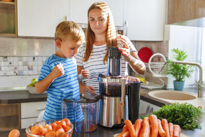 Portrait of smiling family at home