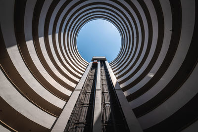 Low angle view of metallic structure against sky