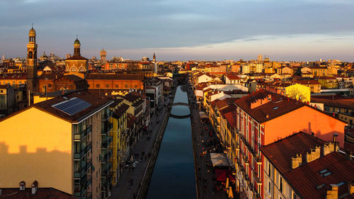 High angle view of buildings against sky during sunset