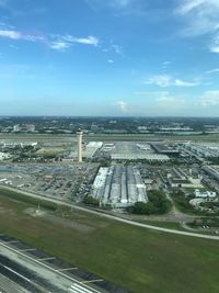 High angle view of highway in city against sky