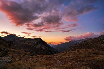 Scenic view of mountains against sky during sunset