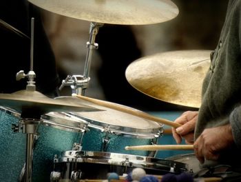 Man playing drum at concert