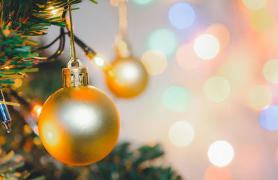 Close-up of christmas decoration hanging on tree