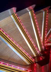Low angle view of illuminated lights at night