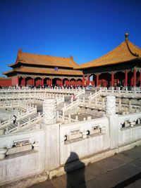 Exterior of historic building against clear blue sky