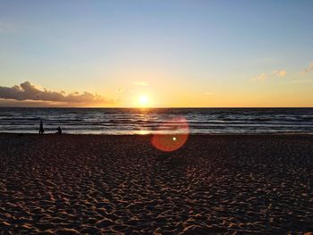 Scenic view of sea at sunset